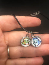 Load image into Gallery viewer, Nintendo Inspired Bubble Bobble 8-bit retro Necklace On Waxed Black Adjustable Cord Blue and Green Character Charms