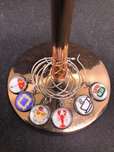 Load image into Gallery viewer, Friends Inspired Silver Wine Charm Set of 6 With Storage Bag Chandler Monica Phoebe Joey Rachel