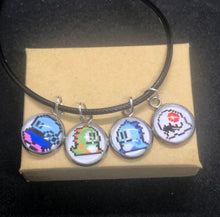 Load image into Gallery viewer, Nintendo Inspired Bubble Bobble 8-bit Retro Charm Necklace On Waxed Black Adjustable Cord Blue, Green, and bad guy Character Charms
